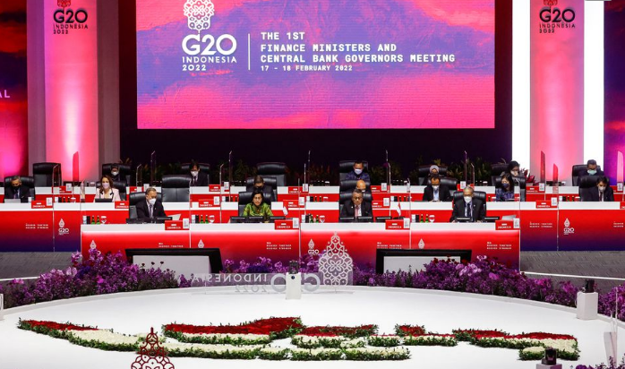 High-level delegates sit at a u-shaped conference arrangement during the g20 finance ministers and central bank governors meeting.