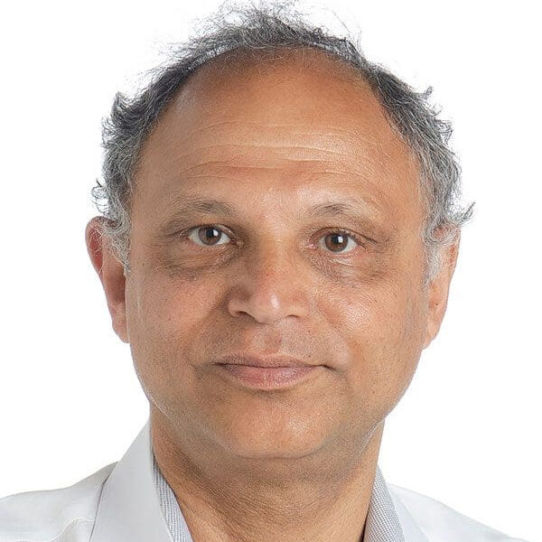 Headshot of a man with gray hair.