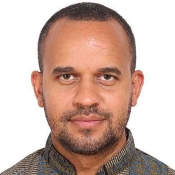 Headshot of a man with a beard.