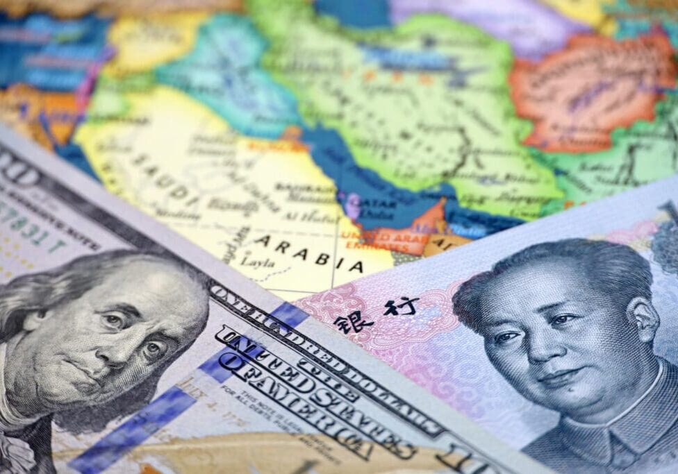 US dollar and Chinese yuan on map.