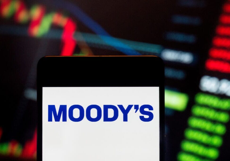 Moody's logo on a phone screen.