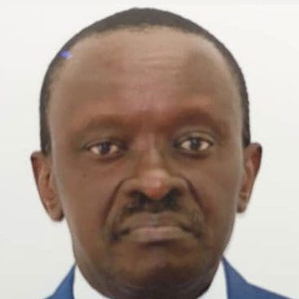 Headshot of a man in a suit