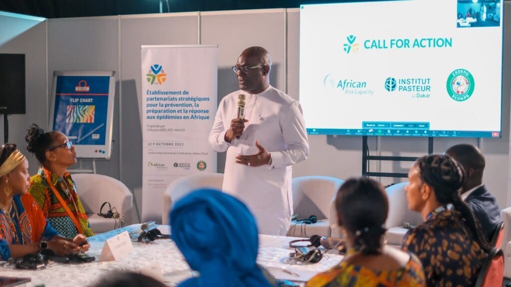 A speaker addressing an audience at a conference focused on epidemic response in africa.