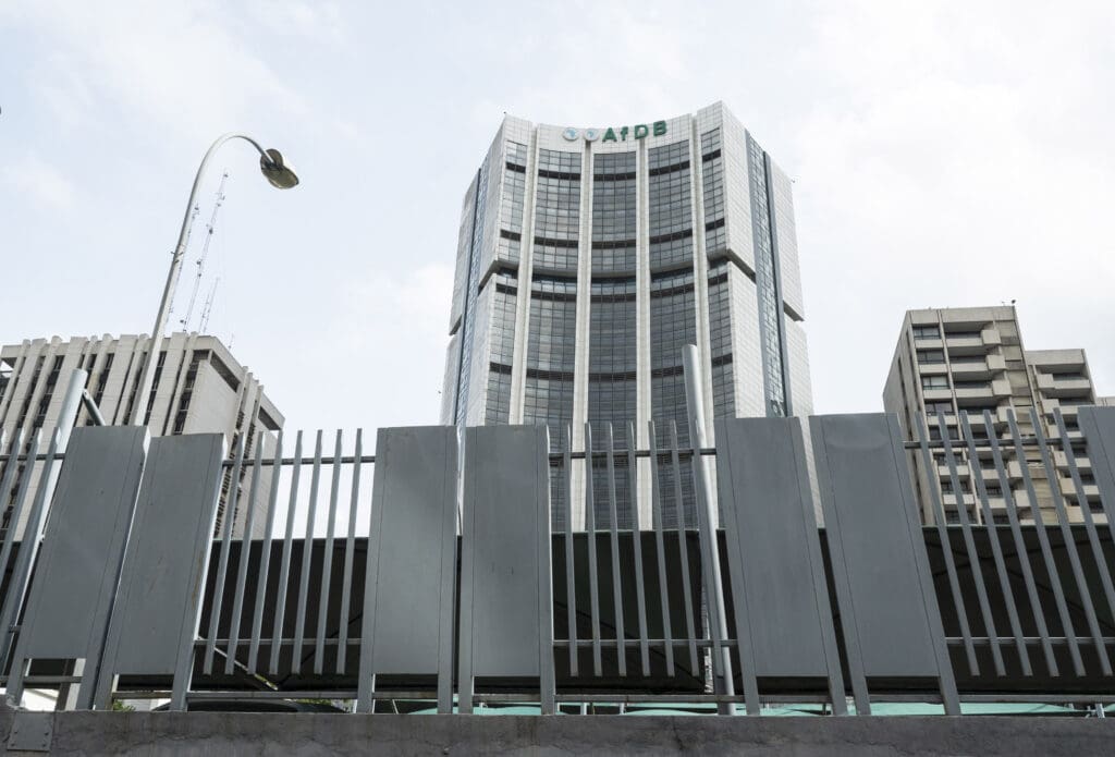 AFDB building with metal fence in front.