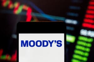 Moody's logo on a phone screen.