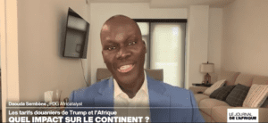 Man discussing Trump's tariffs on Africa.