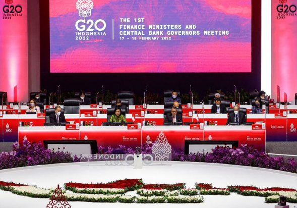 High-level delegates sit at a u-shaped conference arrangement during the g20 finance ministers and central bank governors meeting.