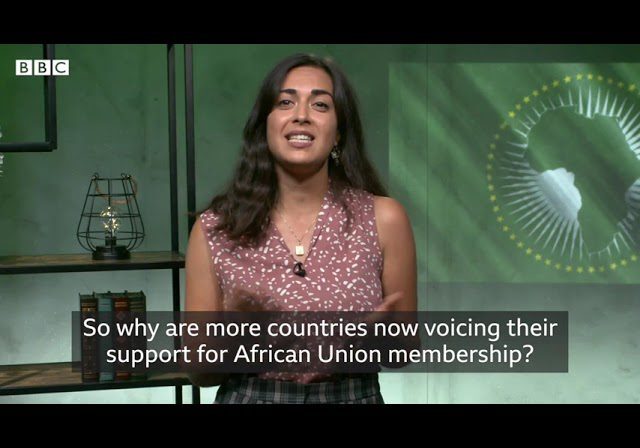A woman presenting a segment on reasons behind increasing support for african union membership.